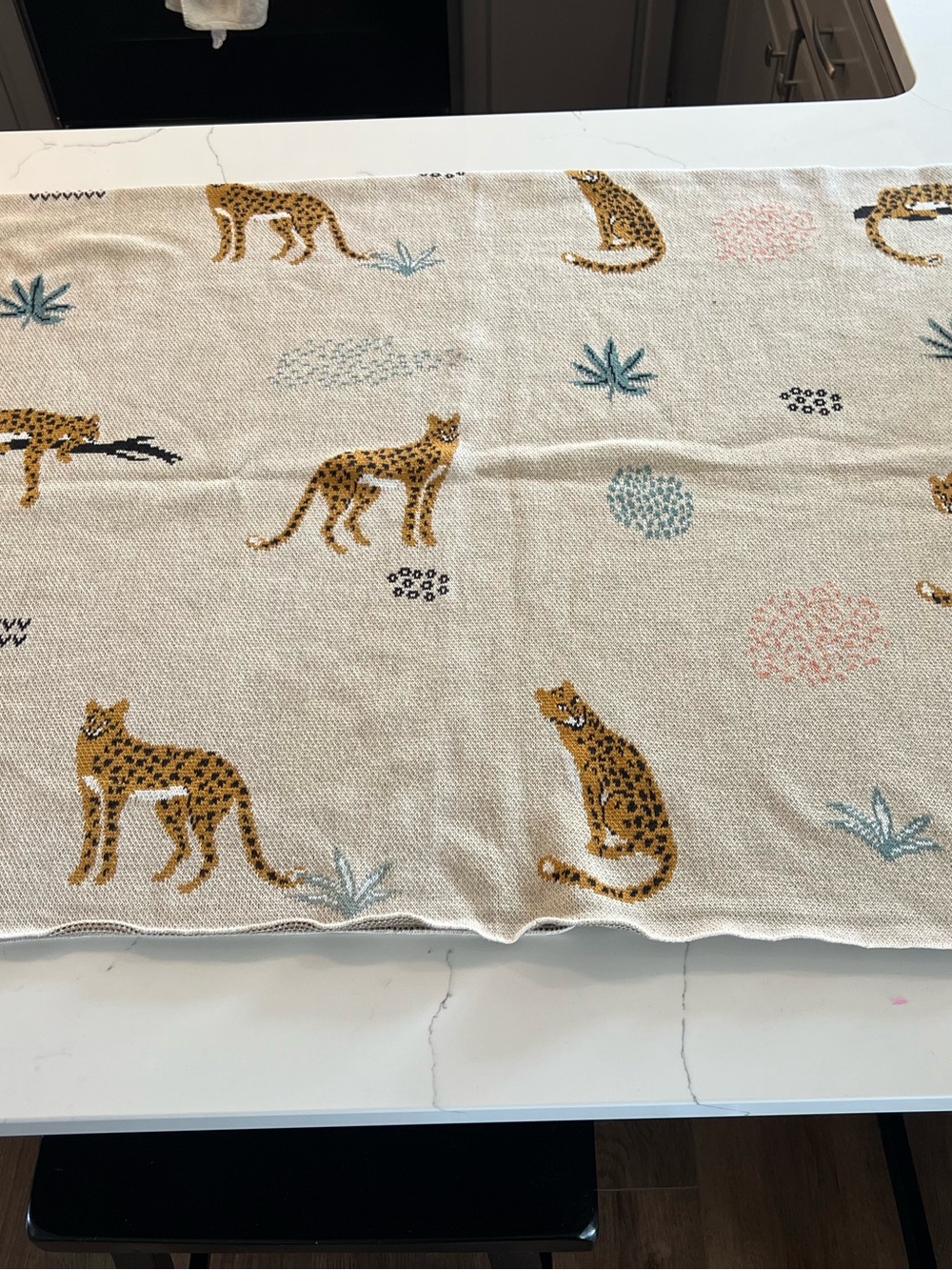 Nicole Miller Cream Throw Blanket with Gold Leopard Motif